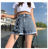 Jeansshorts mit hoher Taille und Schleife und Spitze